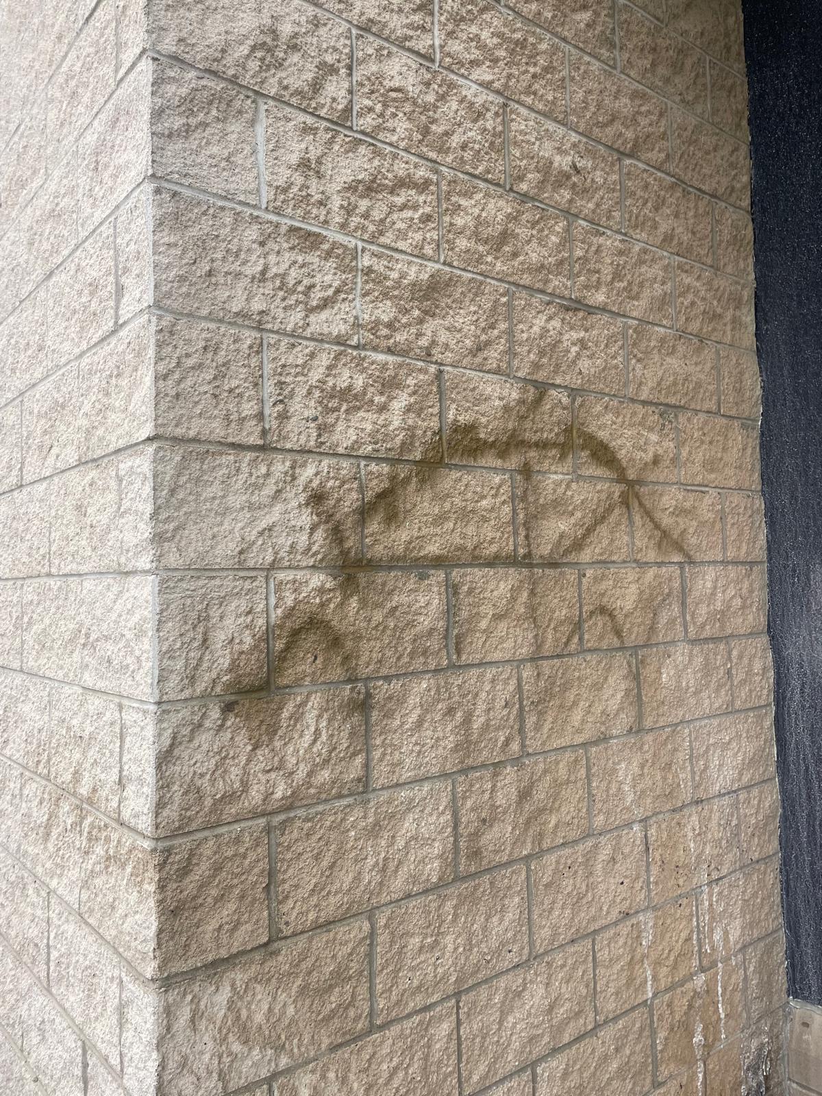 Graffiti on commercial building before removal